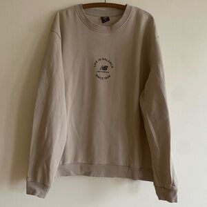 New Balance Men's Beige “Life in Motion” Crewneck Sweater